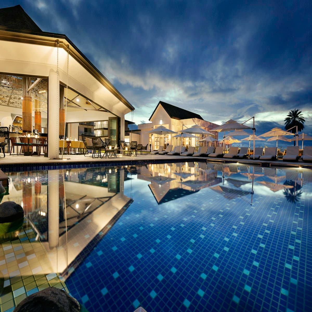 Resort-style pool at dusk